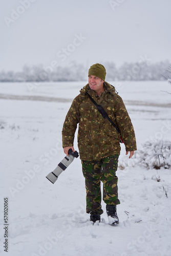 Professional wildlife photographer in the winter