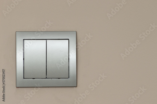 Light switch on wall. turn on or turn off the lights. Saving electric concept. Modern new light switch interior background