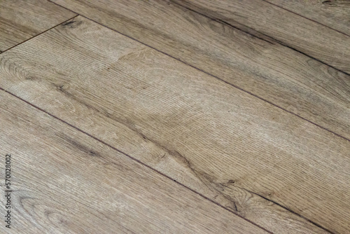 Floor panels background. old brown wooden floor diagonally. new hardwood floor texture