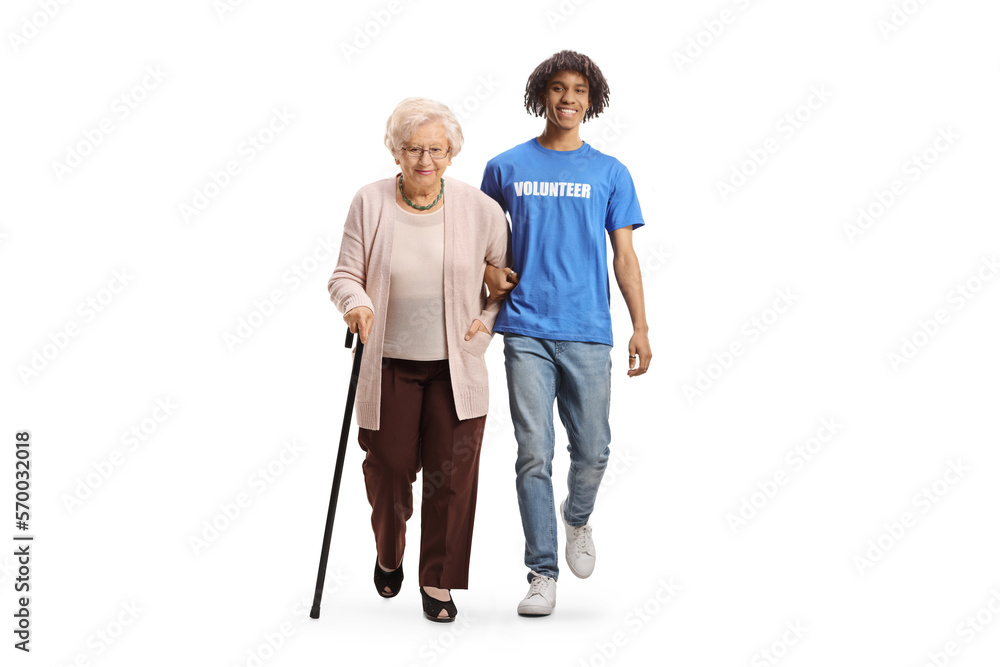Full length portrait of an african american volunteer helping an elderly woman Full length portrait of an african american volunteer helping an elderly woman