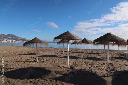 Umbrellas on the beach of Nerja at Spains Costa del Sol