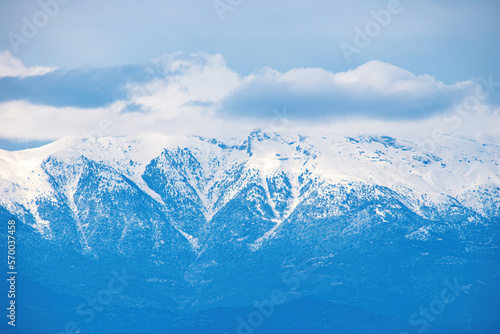 View of the impressive snowy mount Taygetus from Lakonia, Greece © panosk18