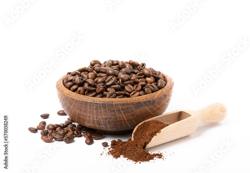 Bowl of ground coffee and beans isolated on white background. Coffee in wooden spoons.
