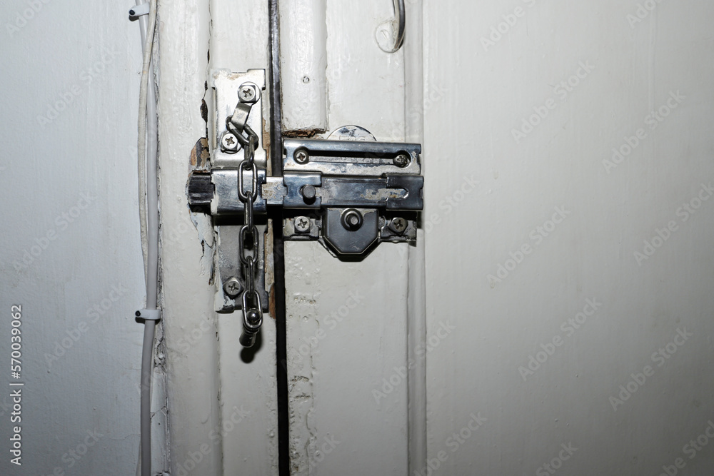antique house door lock silver colored