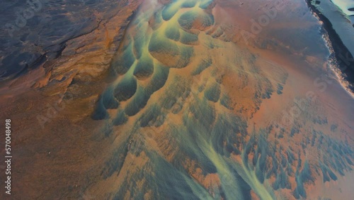 Aerial view of abstract water formation along the coast at Floi Nature Reserve, Iceland. photo