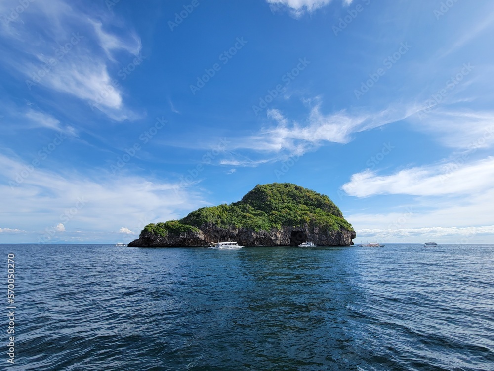 Traditional Fishing Boats by Tiny Tropical Island in Philippines