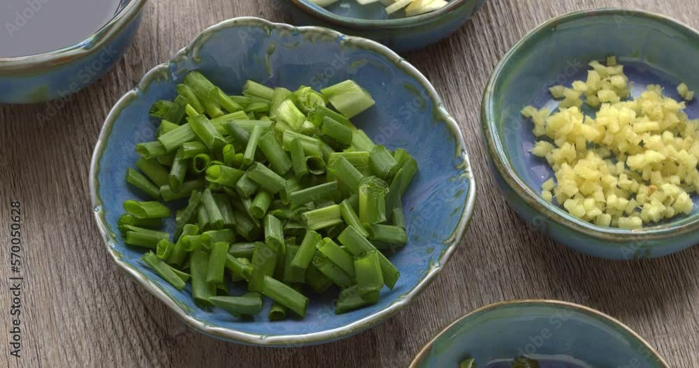 Standard wok seasoning: chili, garlic, ginger, scallions and soy sauce with chinkiang vinegar and sesame oil. Standard wok seasoning: chili, garlic, ginger, scallions and soy sauce with chinkiang vinegar and sesame oil.