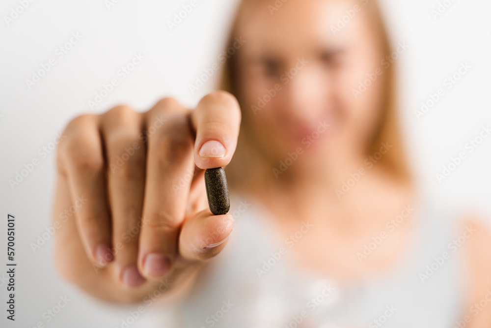 Nutritionist with vitamins pills and capsules of biologically active supplements tablets in hands. Tablets for weight loss. Recommendation for daily dietary. Nutritionist with vitamins pills and capsules of biologically active supplements tablets in hands. Tablets for weight loss. Recommendation for daily dietary.