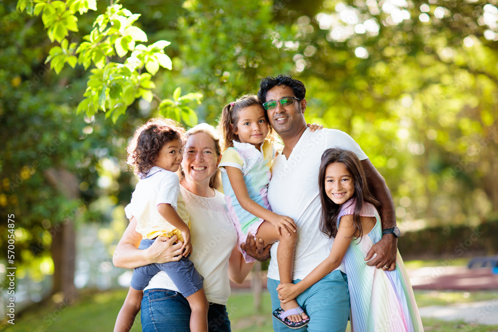 Family in summer park. Parents and kids outdoor. Family in summer park. Parents and kids outdoor.