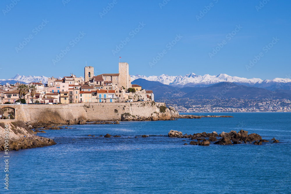 Old town of Antibes, French Riviera, France with snow covered alps in the background