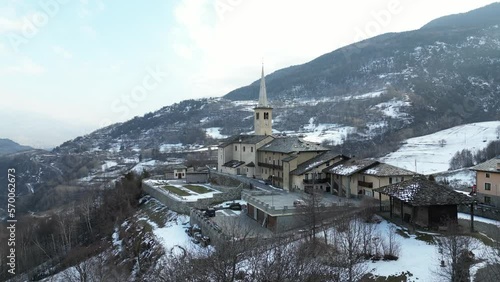 Ripresa aerea chiesa di Introd in Valle d'Aosta d'inverno photo