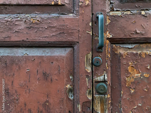 Rusty scraped wooden door © SeffeG