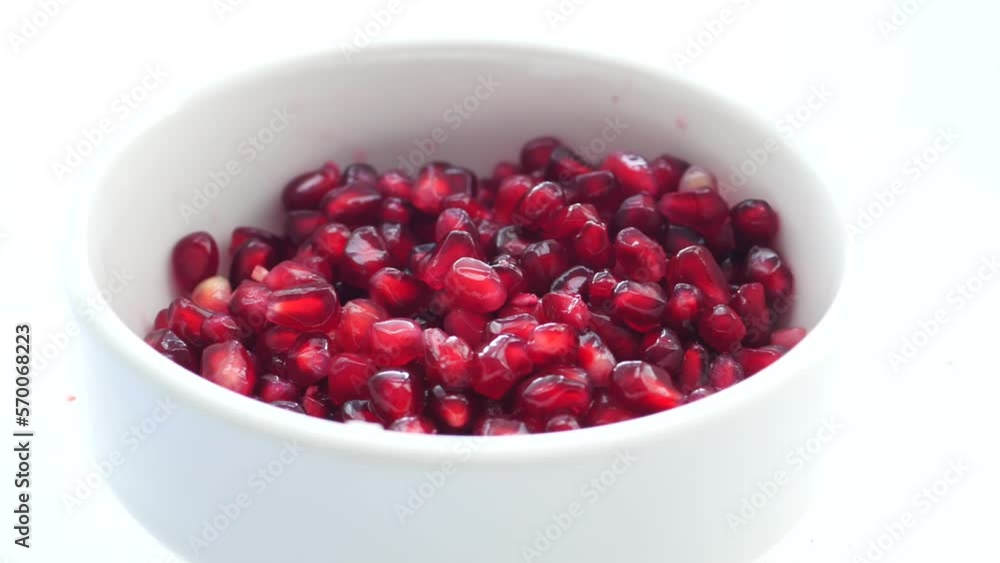 detail shot of pomegranate on table detail shot of pomegranate on table