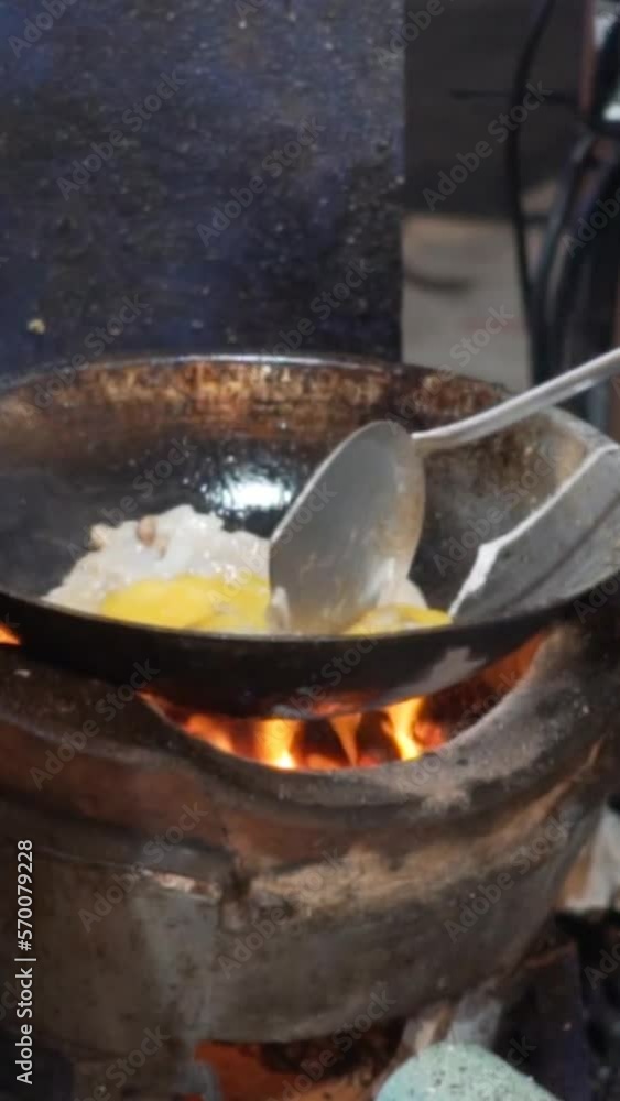 vertical video, portrait video close up of big omelette eggs fried on big pot vertical video, portrait video close up of big omelette eggs fried on big pot