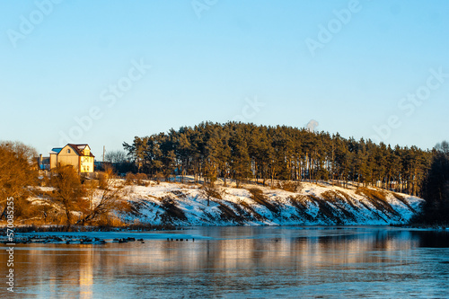 sunset over the river in winter