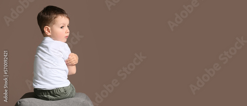 Sad little boy with autisti...