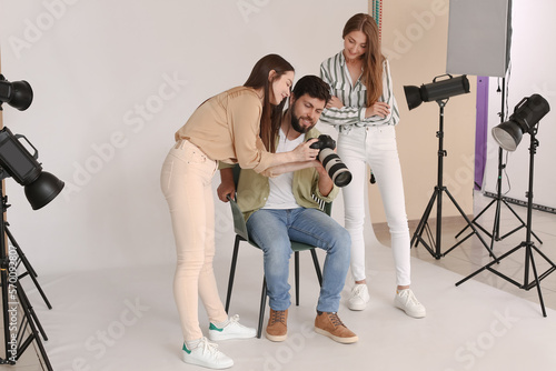 Female photographer and her...
