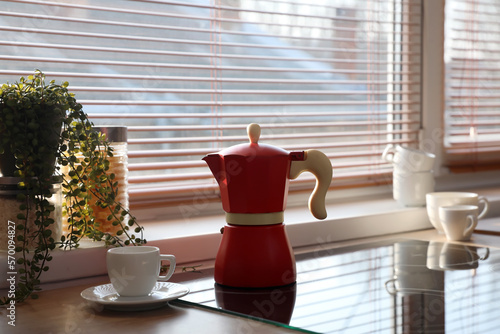 Red moka pot and white espr...