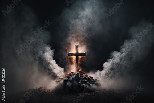 fire on a wooden cross in a dark night landscape. misty and foggy. smoke and flames. photo