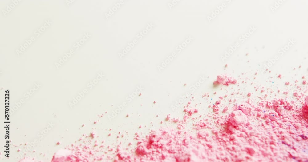 Video of pink powder with copy space on white background