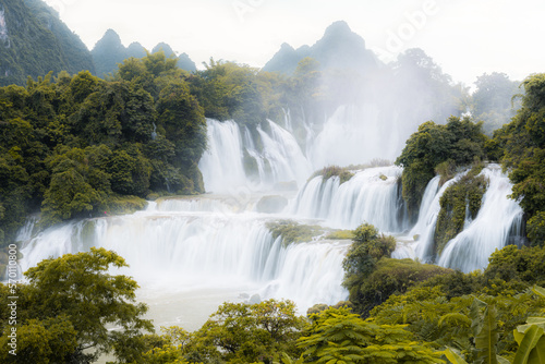 Detian waterfall is the biggest trans boundary waterfall in Asia  situated on the border of China  Guangxi  and Vietnam surrounded by beautiful limestone mountains