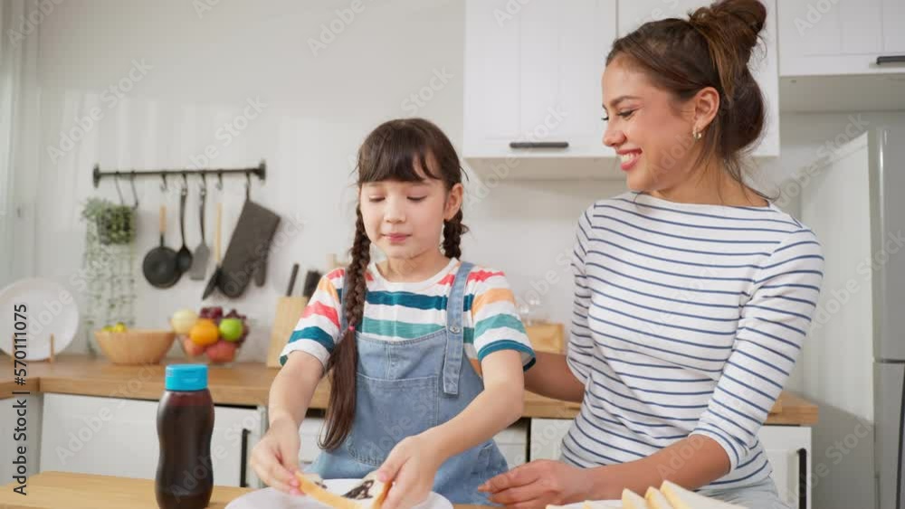 Caucasian happy family, parent spend time with kid together at home. Caucasian happy family, parent spend time with kid together at home.