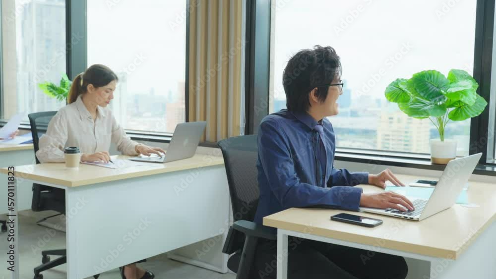 Group of Asian attractive business people working in office workplace. Group of Asian attractive business people working in office workplace.