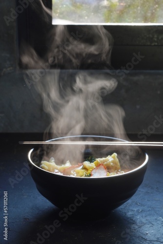 egg noodles with pork wonton soup or pork dumplings soup and vegetable - Asian food style.hot food