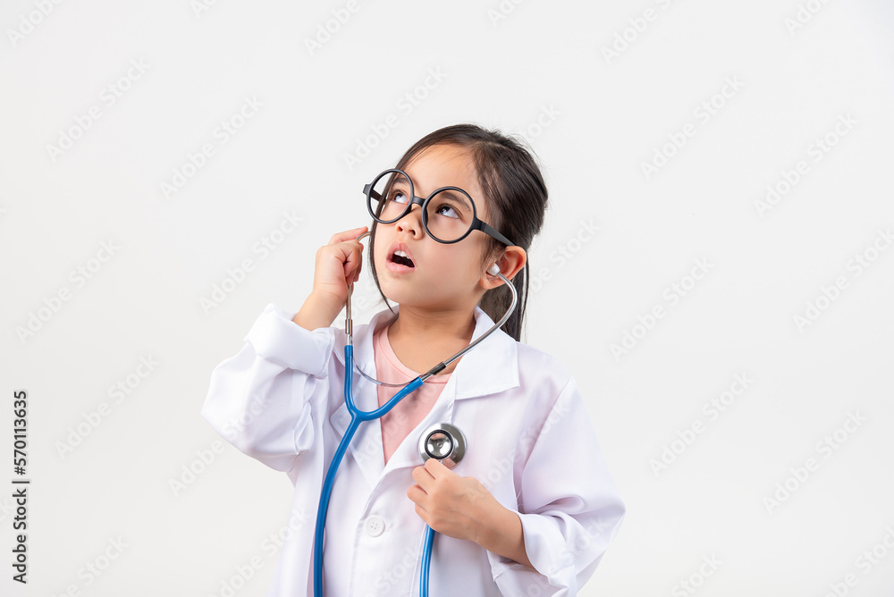 Asia little girl playing doctor isolated on white Asia little girl playing doctor isolated on white