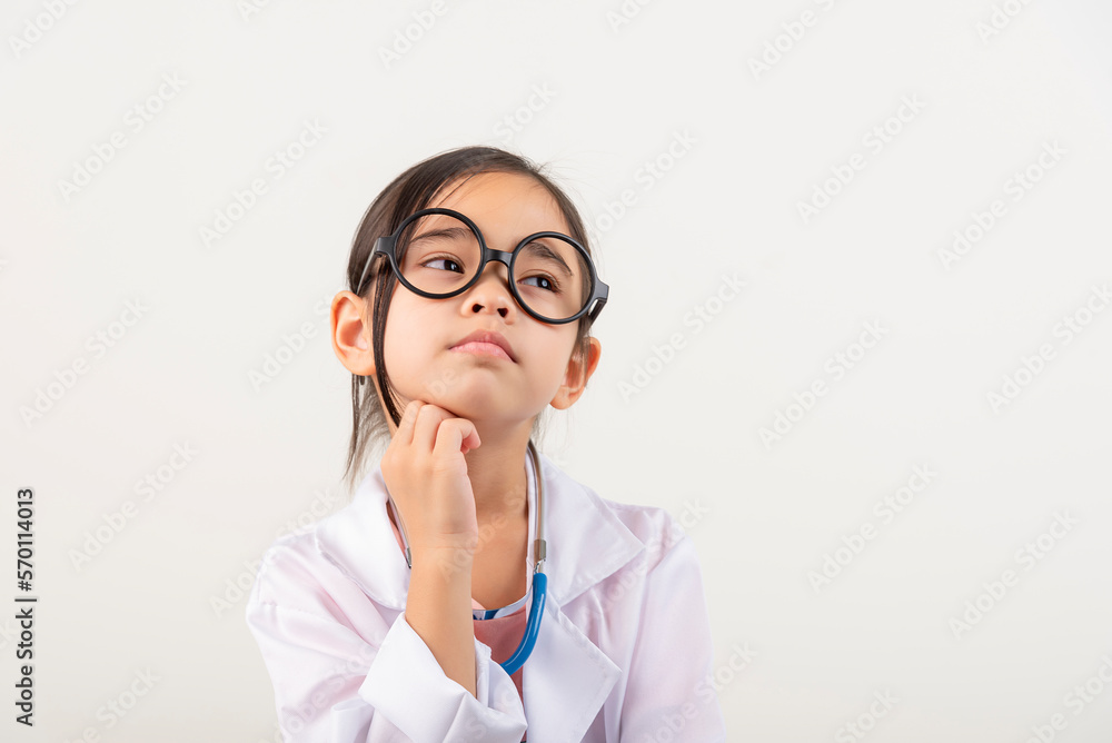Asia little girl playing doctor isolated on white Asia little girl playing doctor isolated on white