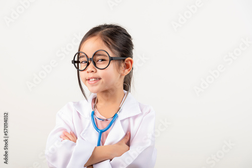 Asia little girl playing doctor isolated on white