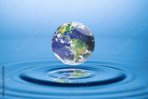 world concept and resources Water, water management. globe floating on water