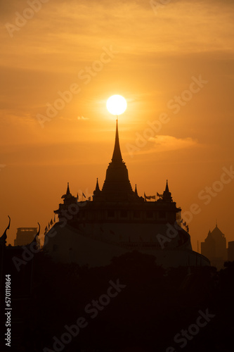 At a temple in the central of Bangkok Thailand  The morning sun will gradually move up to stand out at the end of this temple pagoda. This miracle happens only twice a year.