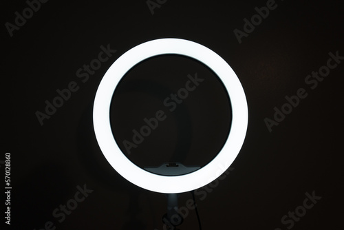 LED ring light with a dark background	
