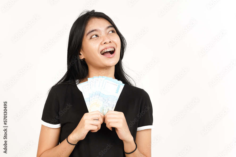 Holding 50000 Rupiah Banknote of Beautiful Asian Woman Isolated On White Background Holding 50000 Rupiah Banknote of Beautiful Asian Woman Isolated On White Background