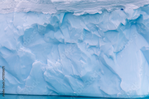 Blue Iceberg floating in the sea in Antarctica
