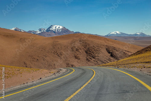 Road in Moon Valley dramatic landscape at Sunset, Atacama Desert, Chile