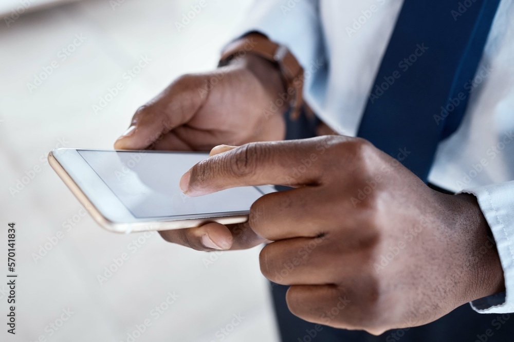 Hands, phone screen and black man in office with typing, communication and texting on chat app. Businessman, smartphone and reading on iot ux, schedule or planning for start to morning in workplace Hands, phone screen and black man in office with typing, communication and texting on chat app. Businessman, smartphone and reading on iot ux, schedule or planning for start to morning in workplace