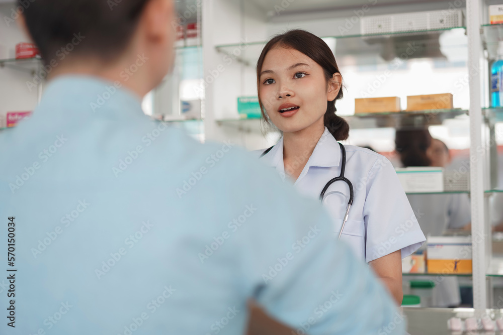 Medicine and health concept, Female pharmacist hold pill bottle and explain medicinal properties Medicine and health concept, Female pharmacist hold pill bottle and explain medicinal properties
