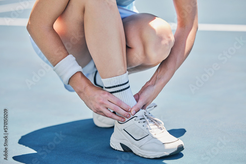 Ankle pain of tennis player, woman on sports ground with healthcare risk, muscle accident or training problem. Competition, game and athlete on fitness court with foot injury and legs massage