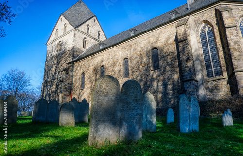 Historische romanische Kirche mit mittelalterlichem Friedhof in Syburg bei Dortmund photo