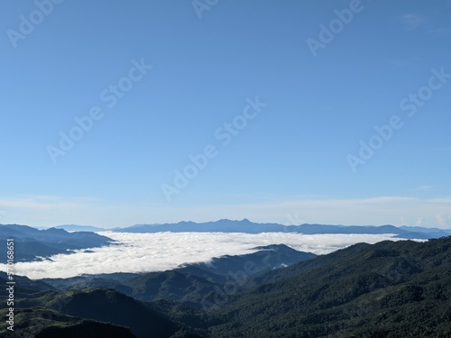 Fototapeta Naklejka Na Ścianę i Meble -  landscape with clouds over the mountains in state oaxaca, mexico