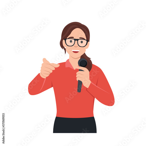 Young woman mc with microphone talking and pointing to the audience. Flat vector illustration isolated on white background