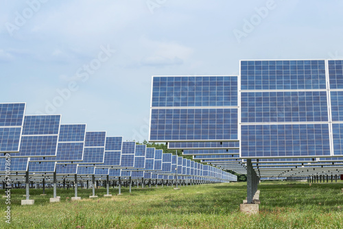 solar cells or photovoltaics in solar power station convert light energy from the sun into electricity alternative renewable clean energy efficiency from the sun