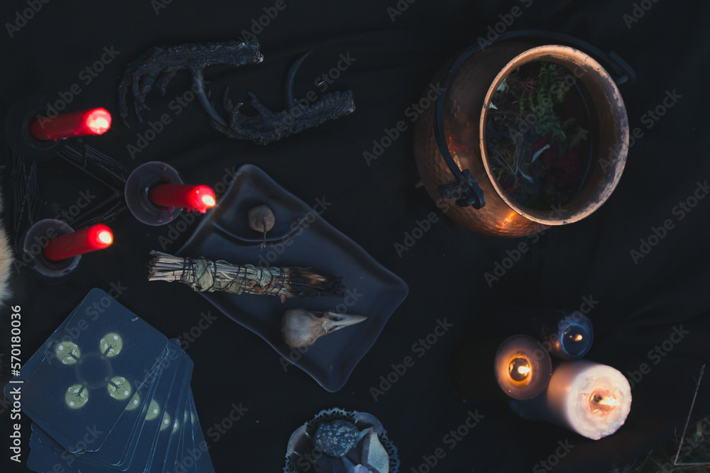 Close up preparing for occult practice concept photo. Dark witchcore aesthetic. Top view photography with blurred background. High quality picture for wallpaper, travel blog, magazine, article
