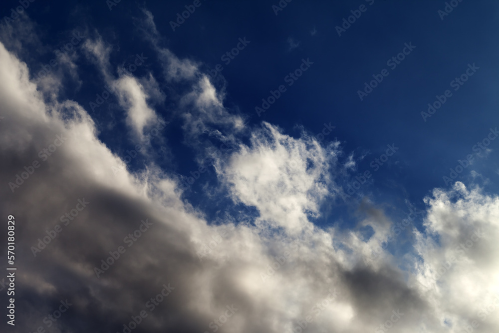 Obraz premium Blue sky with sunlight clouds.