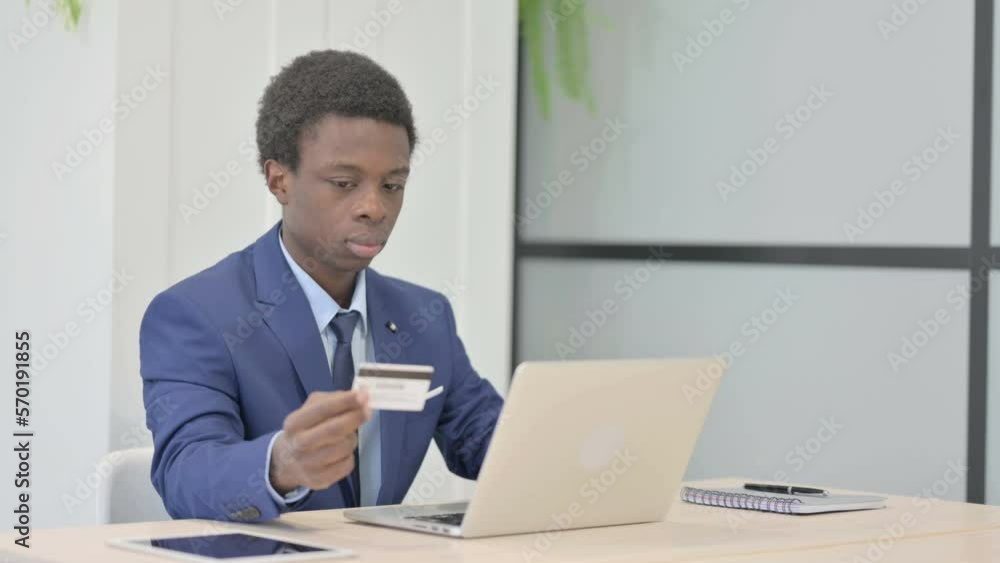 African Businessman Unable to make Online Payment on Laptop African Businessman Unable to make Online Payment on Laptop