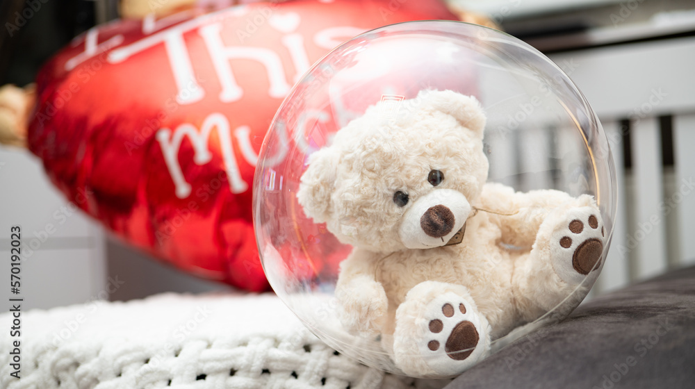 Cute teddy soft bear with red heart. Valentine's day or 8 March celebration