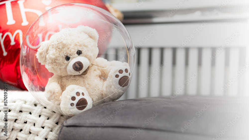 Cute teddy soft bear with red heart. Valentine's day or 8 March celebration