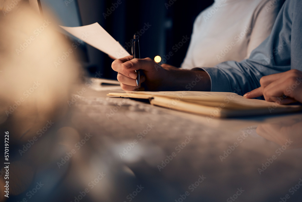 Hand, writing or financial advisor team at night for finance, investment review or planning global budget. Paper, economy strategy or business man and woman hands for tax, audit or company investment Hand, writing or financial advisor team at night for finance, investment review or planning global budget. Paper, economy strategy or business man and woman hands for tax, audit or company investment